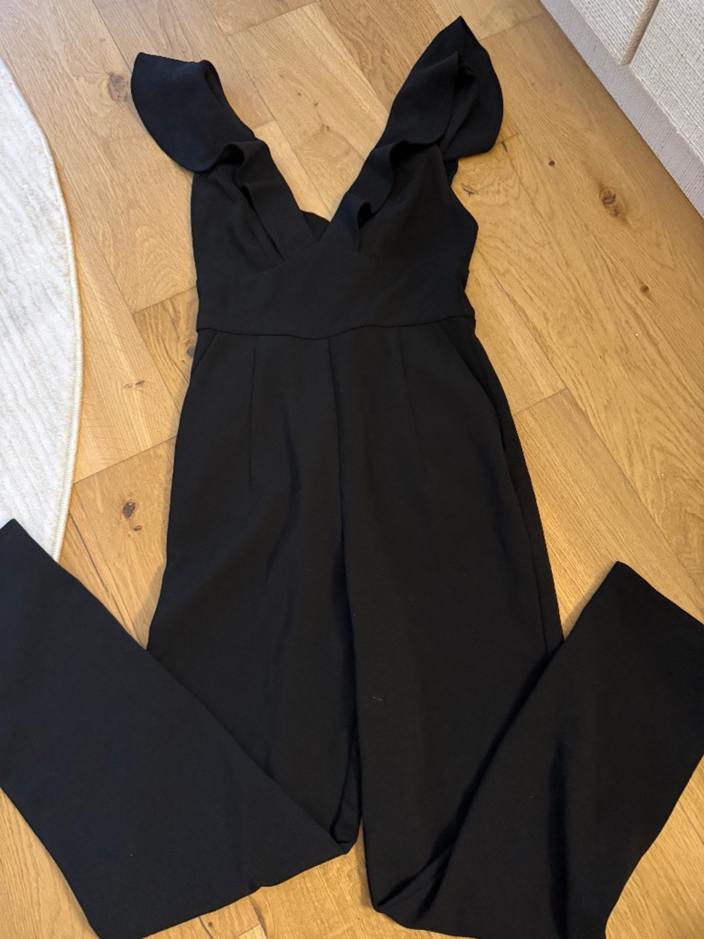 Lulu's Sleeveless Ruffles Black Jumpsuit